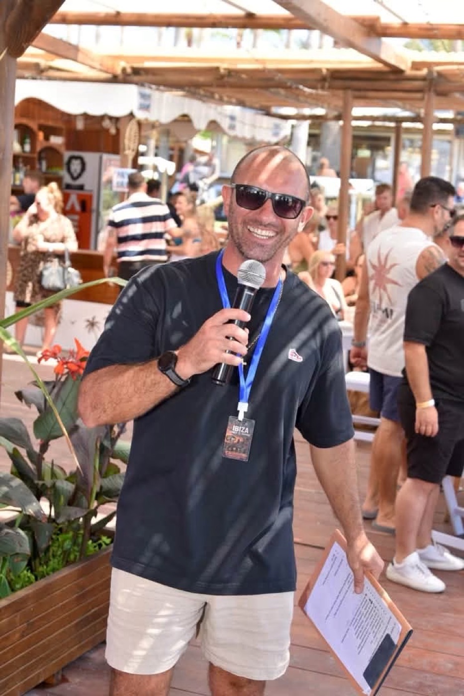 James with a microphone, ready to host